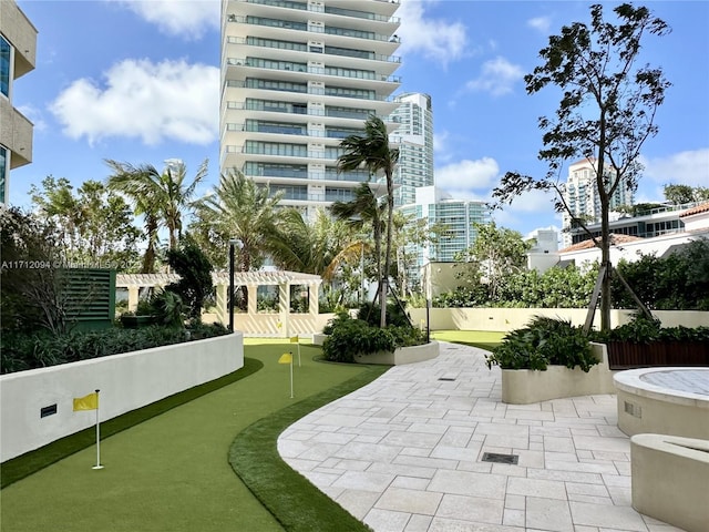 view of home's community with a gazebo and a patio area