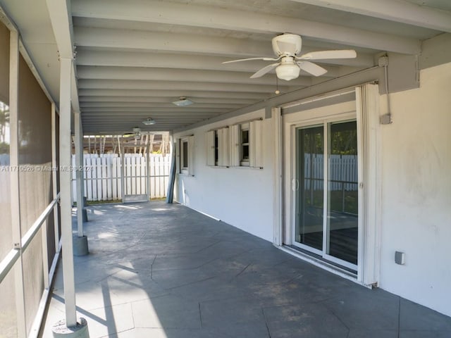 view of patio featuring ceiling fan