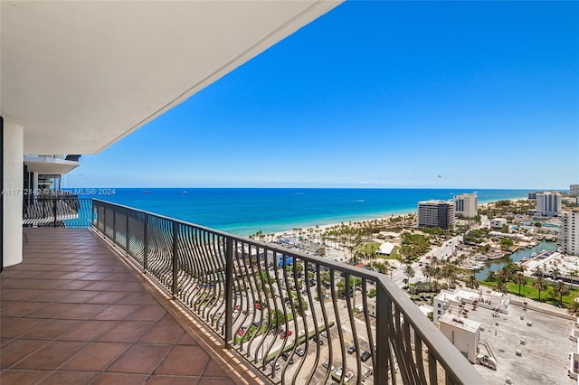 balcony featuring a water view