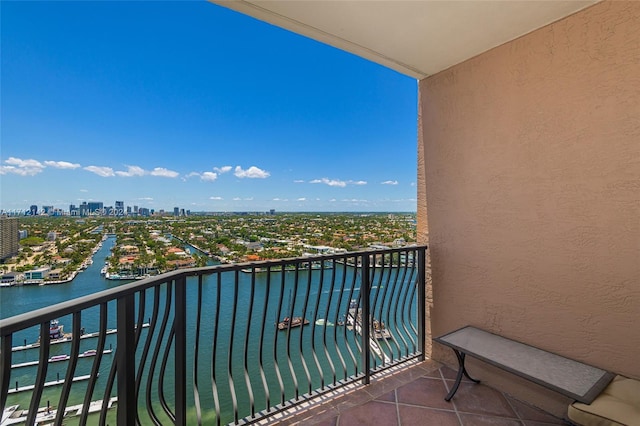 balcony featuring a water view