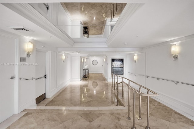 hallway with crown molding