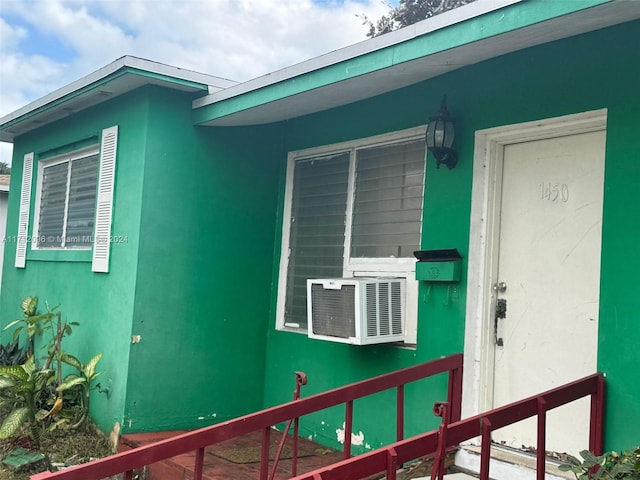 property entrance with cooling unit