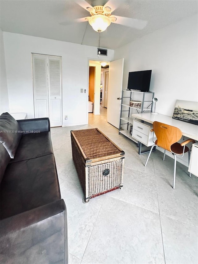 1016 Newcastle A 1016, Boca Raton, FL 33434 - living area featuring ceiling fan and tile patterned flooring