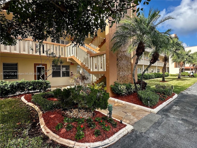 1016 Newcastle A 1016, Boca Raton, FL 33434 - view of building exterior featuring stairs