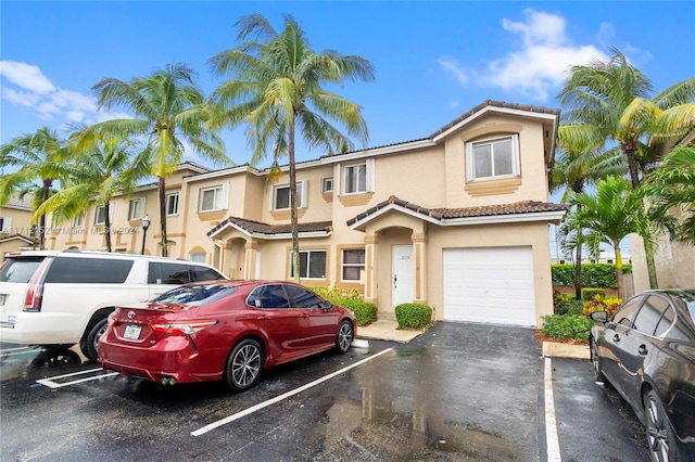 view of front of property with a garage