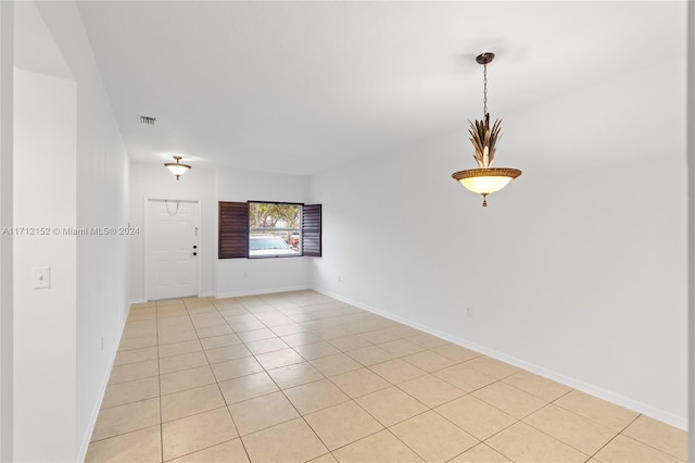 view of tiled spare room