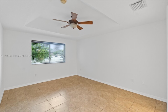 spare room with ceiling fan