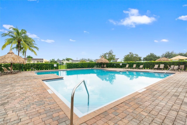 view of pool featuring a gazebo and a patio area