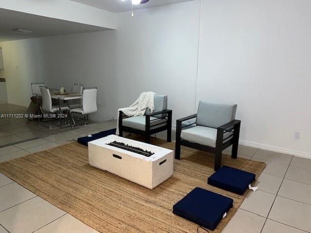 sitting room with light tile patterned floors