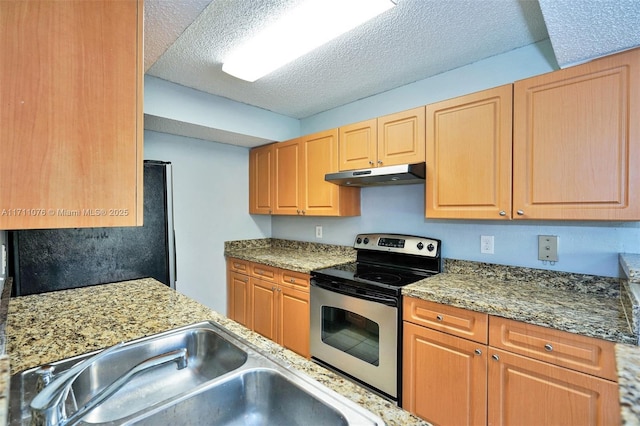 kitchen featuring light stone counters, sink, stainless steel electric stove, and a textured ceiling