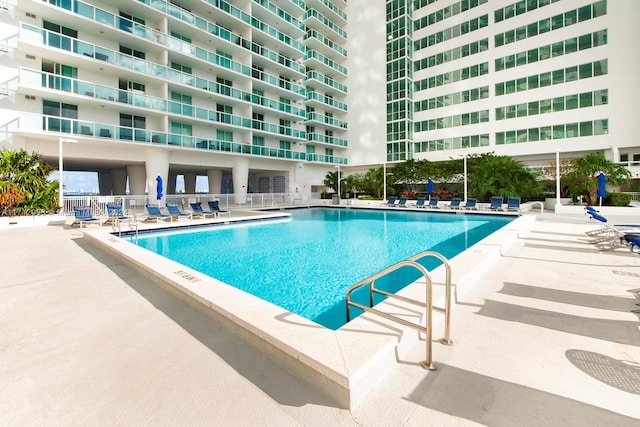 view of pool featuring a patio