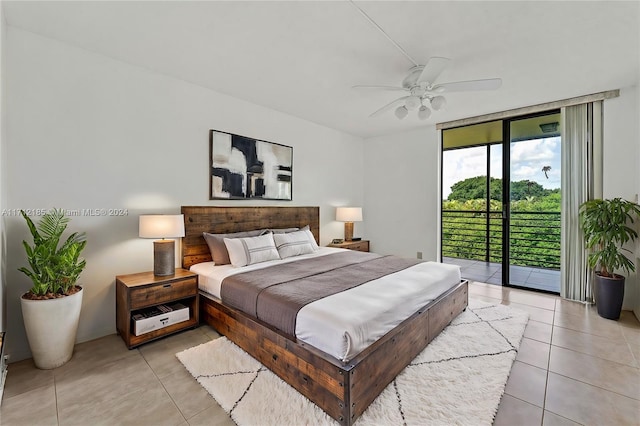 tiled bedroom featuring access to outside and ceiling fan