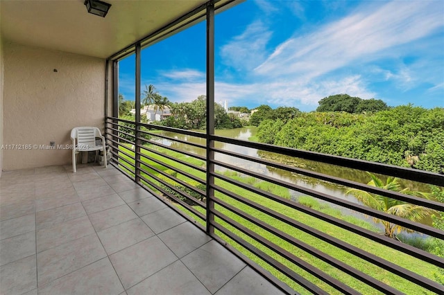 balcony featuring a water view