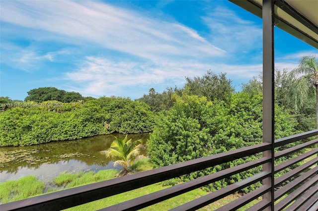 balcony featuring a water view