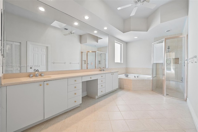 bathroom featuring vanity, separate shower and tub, and ceiling fan