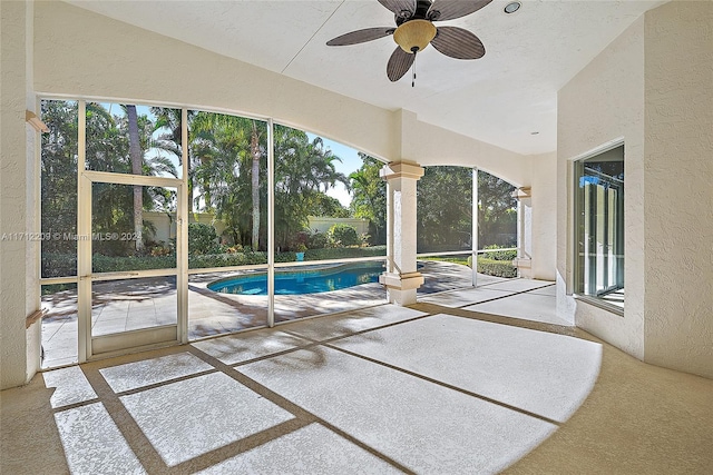 view of pool featuring a patio and ceiling fan