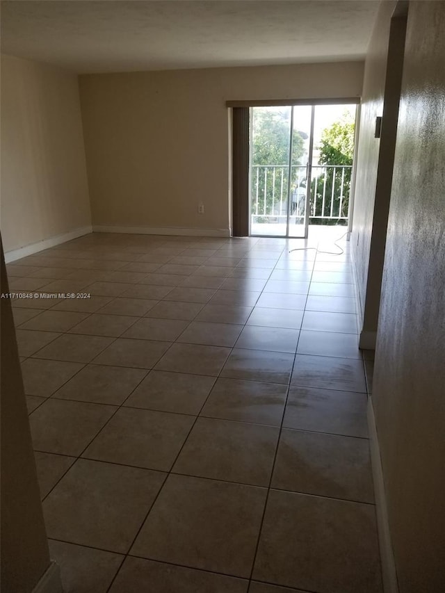 view of tiled spare room