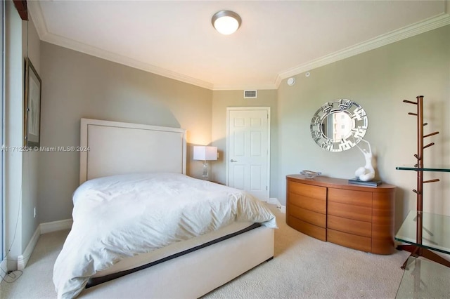 bedroom with light colored carpet and ornamental molding