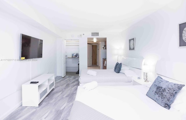 bedroom featuring light hardwood / wood-style flooring