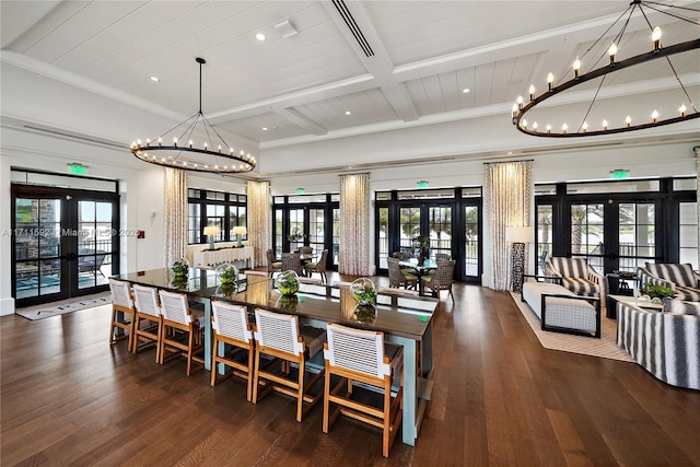 dining space featuring beam ceiling, french doors, and dark wood-type flooring