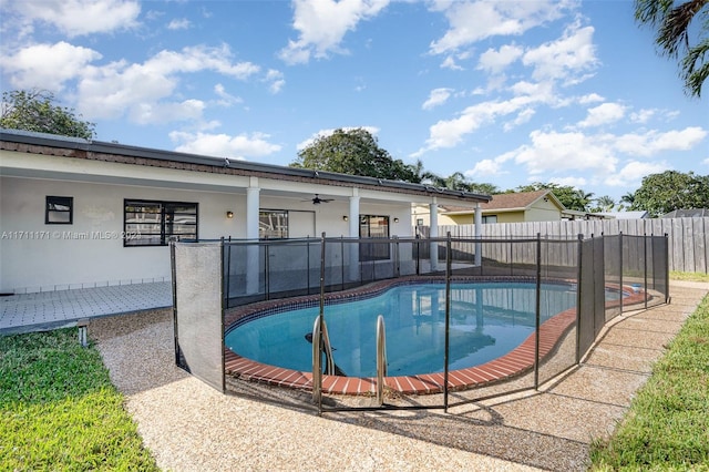 view of pool featuring ceiling fan and a patio area