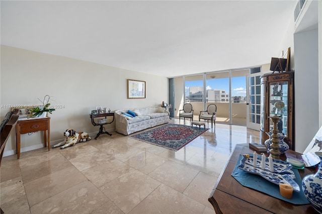 living room with french doors and floor to ceiling windows