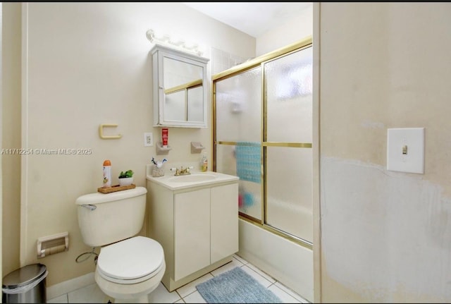 full bathroom featuring tile patterned flooring, vanity, toilet, and enclosed tub / shower combo