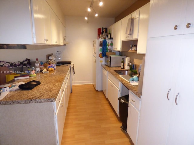 kitchen with dishwasher, light hardwood / wood-style flooring, white cabinetry, and stainless steel electric stove