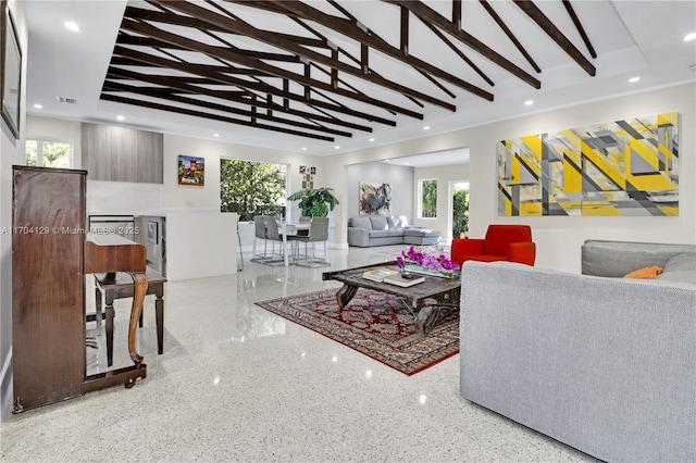 9008 Dickens Ave, Surfside, FL 33154 - living room with beam ceiling, recessed lighting, and speckle patterned floor