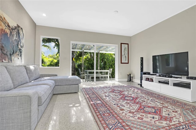 9008 Dickens Ave, Surfside, FL 33154 - living room featuring speckle patterned floor, plenty of natural light, and recessed lighting