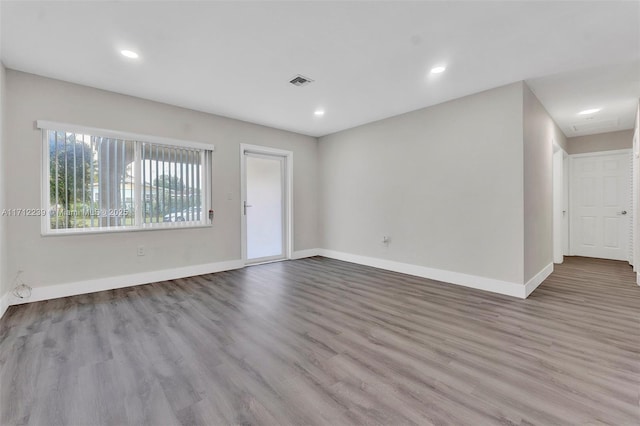 unfurnished room featuring light wood-type flooring