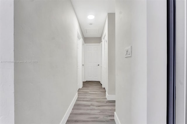 hallway featuring light hardwood / wood-style flooring