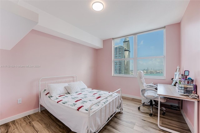 bedroom featuring light hardwood / wood-style floors