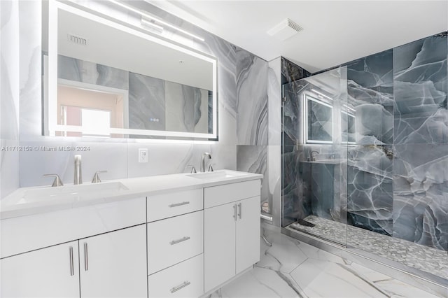 bathroom with vanity and walk in shower