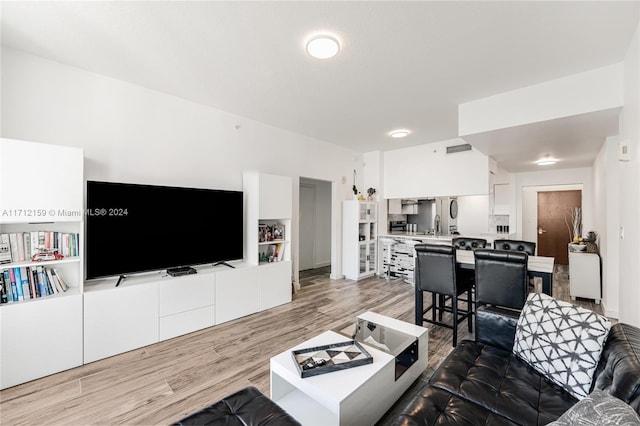 living room with hardwood / wood-style flooring