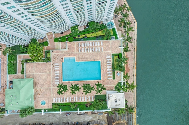 birds eye view of property featuring a water view