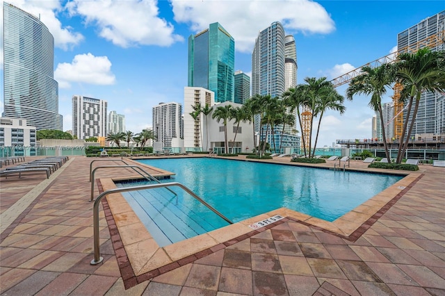 view of swimming pool featuring a patio