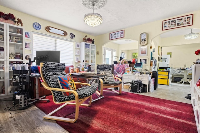 2716 Polk St, Hollywood, FL 33020 - interior space featuring arched walkways and wood finished floors