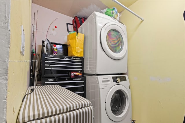 2716 Polk St, Hollywood, FL 33020 - laundry area with stacked washing machine and dryer