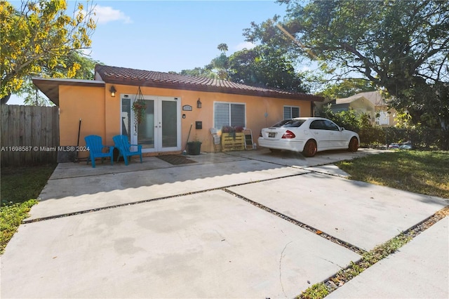 back of property with french doors