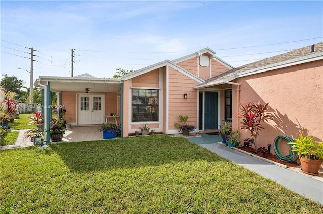 view of front of property with a front lawn