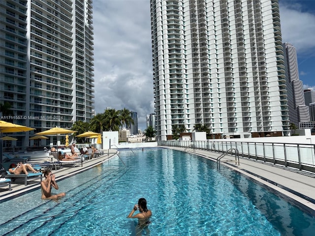 view of swimming pool featuring a patio