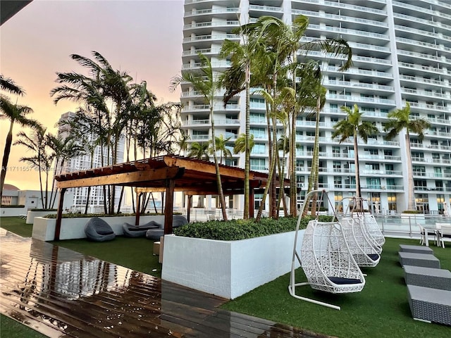 view of dock with a pergola