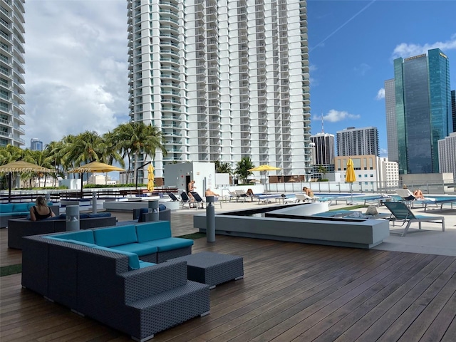 wooden deck with an outdoor hangout area