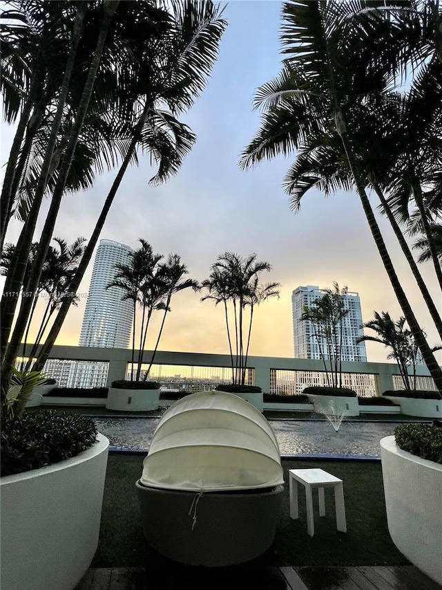 view of patio terrace at dusk