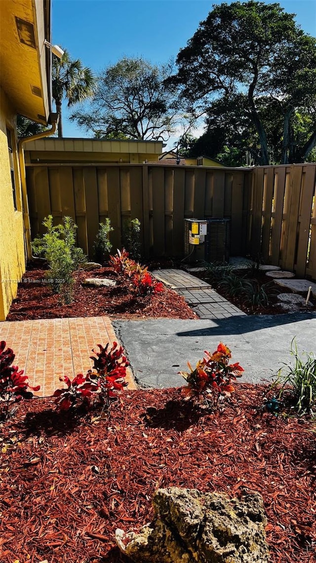 view of yard featuring central AC