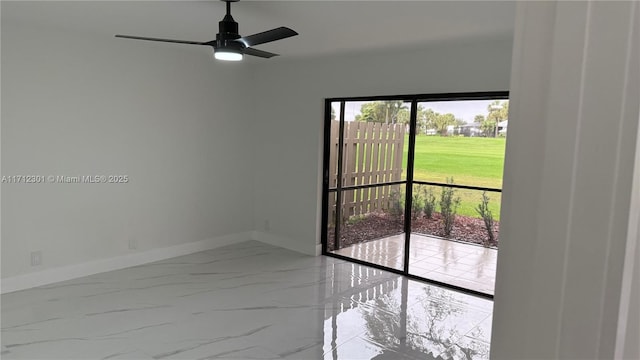 unfurnished room with ceiling fan