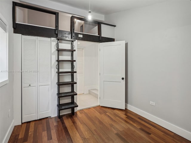 interior space with dark hardwood / wood-style floors