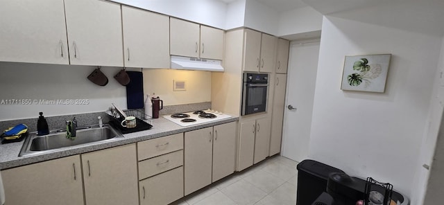 kitchen with sink, light tile patterned floors, white stovetop, and stainless steel oven