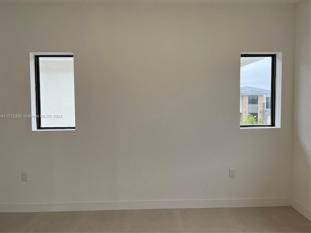 view of tiled spare room